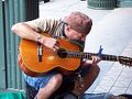 Busker playing at Pike Place Market 2008.JPG